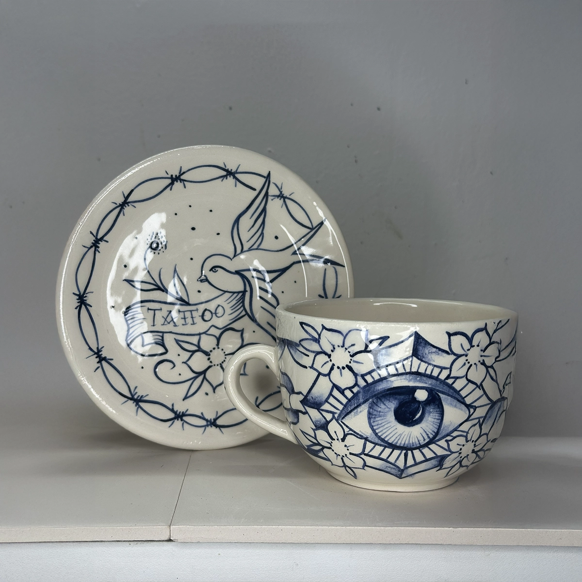 taza daggers eye bloom + plato swallow tattoo taza daggers eye bloom + plato swallow tattoo